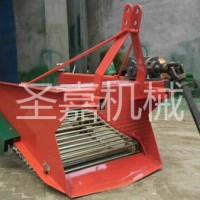 拖拉機帶的土豆收獲機圖片  紫薯挖掘機工作視頻