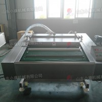 供應山東小康牌DZ-1000連續滾動真空包裝機